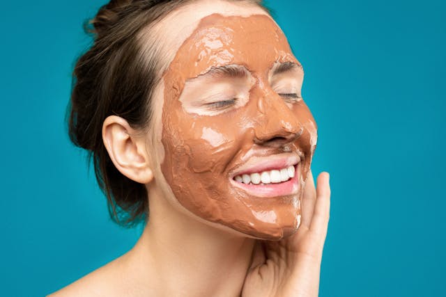 Woman with clay mask